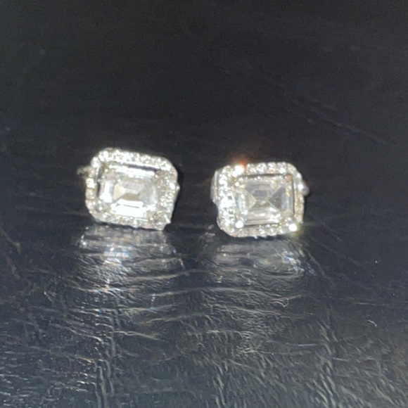 Jewelry - Women’s clip on emerald earrings.